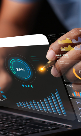 A developer coding on a laptop